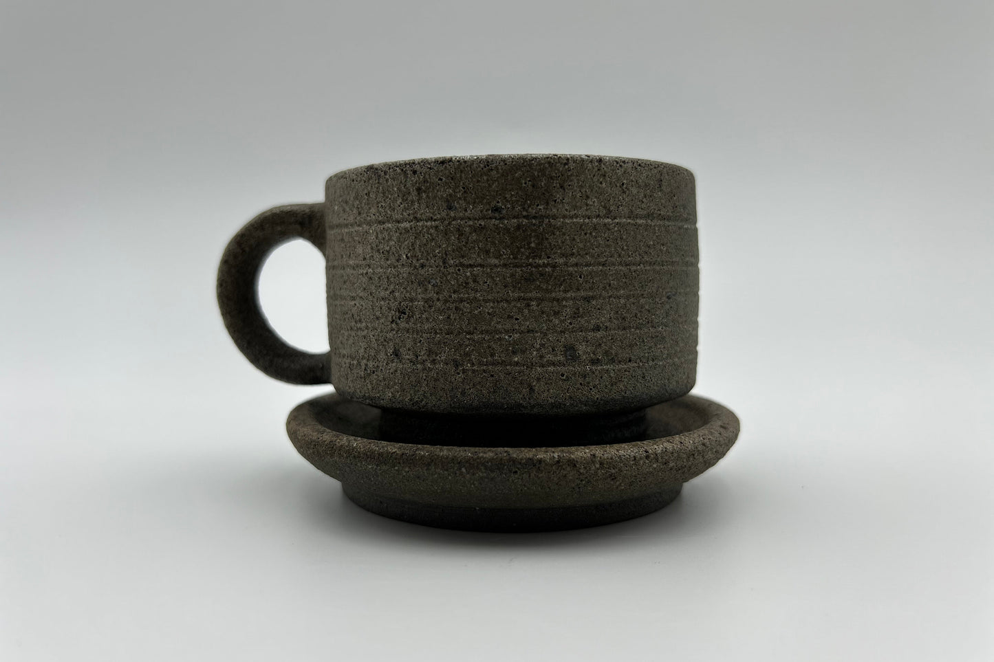 Handcrafted Black Sand Cup: Nature themed Minimalist Unglazed Coffee Cup